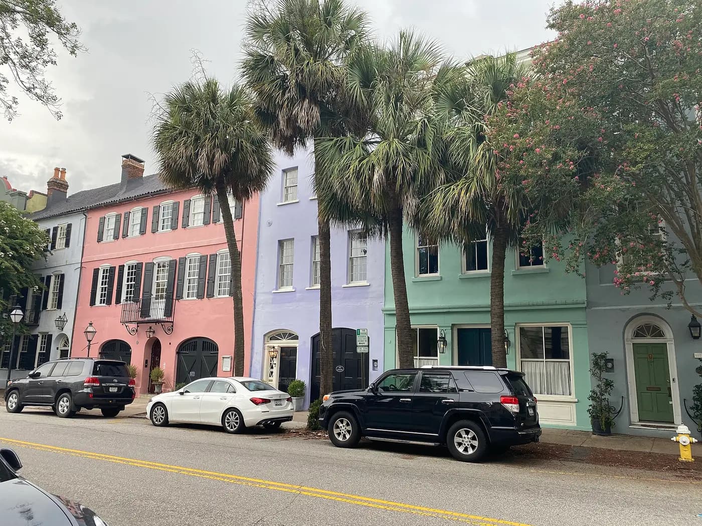 Pastel-coloured historic townhouses on Rainbow Row in Charleston