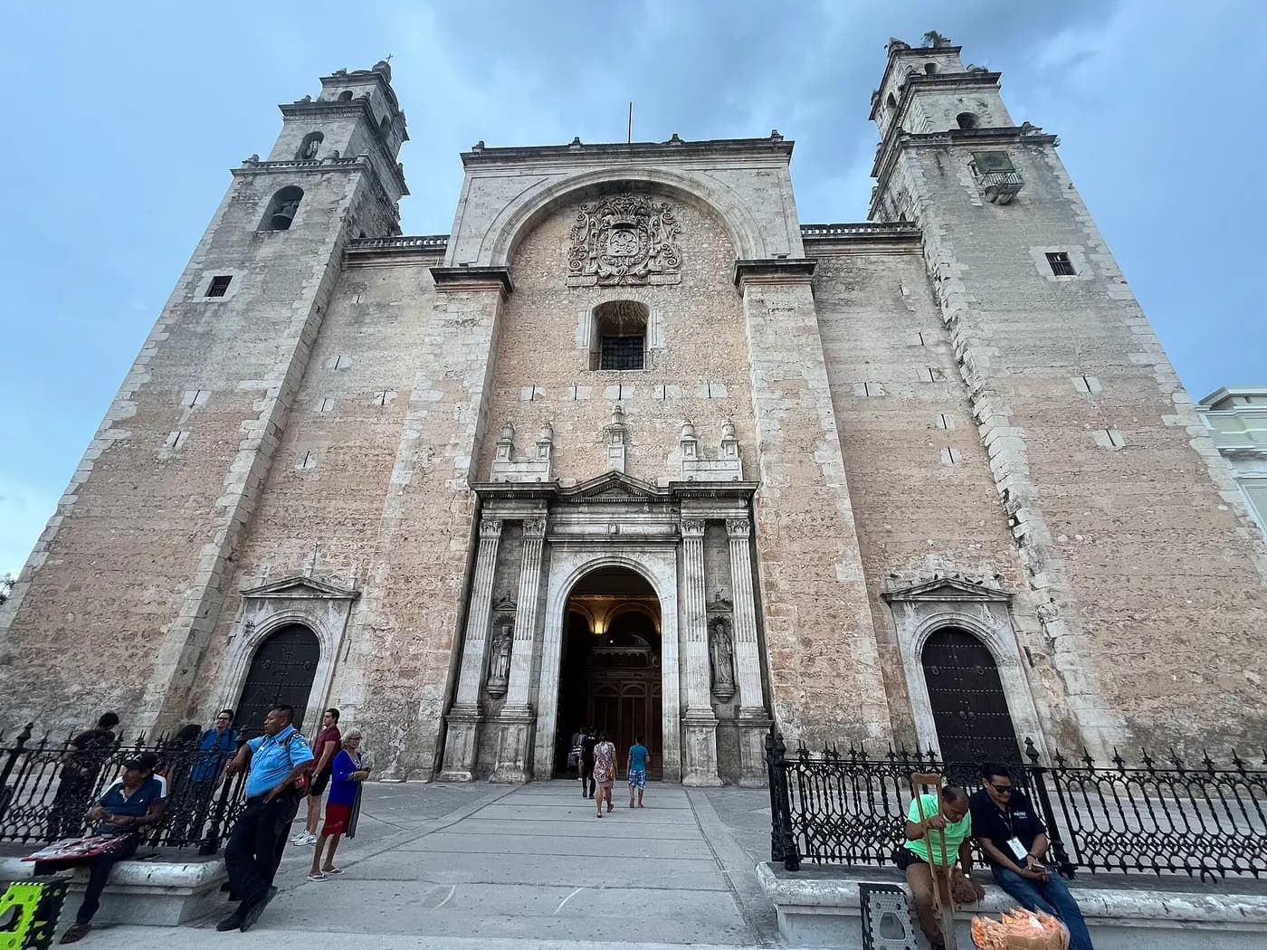 The pale stone front and twin towers of San Ildefonso Cathedral on Mérida's main square