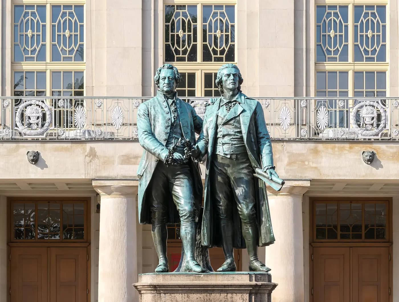 The bronze statue of Goethe and Schiller in front of the German National Theatre in Weimar