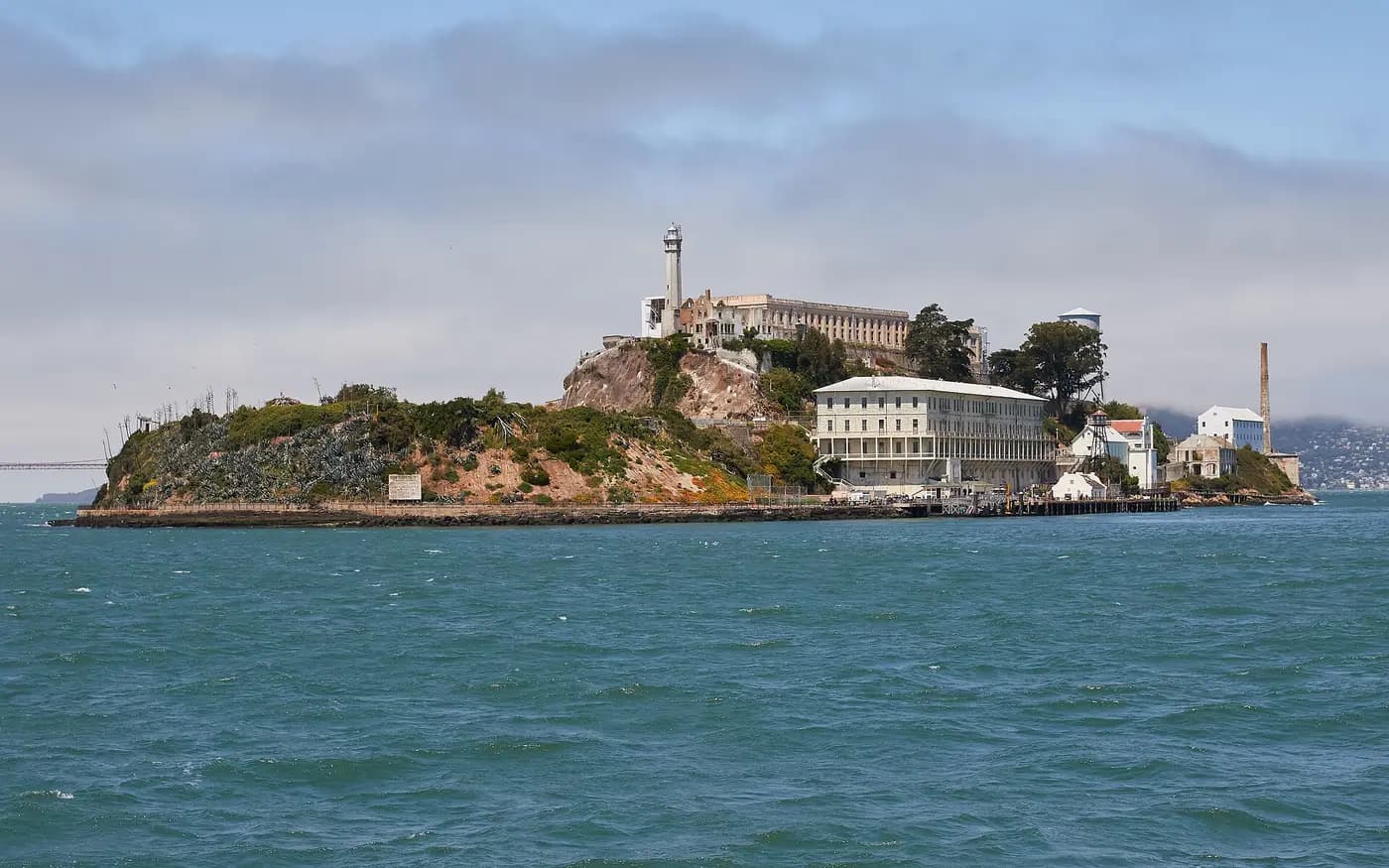 Alcatraz Island in San Francisco Bay, its cellhouse and lighthouse on the rocky summit