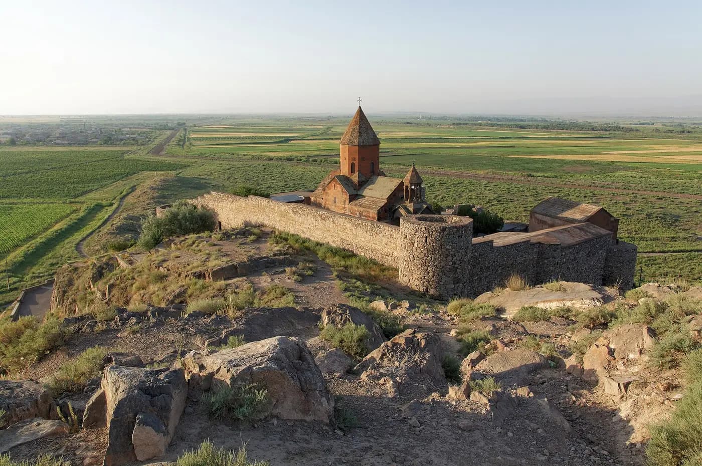 Khor Virap monastery on its hill with the Ararat plain beyond