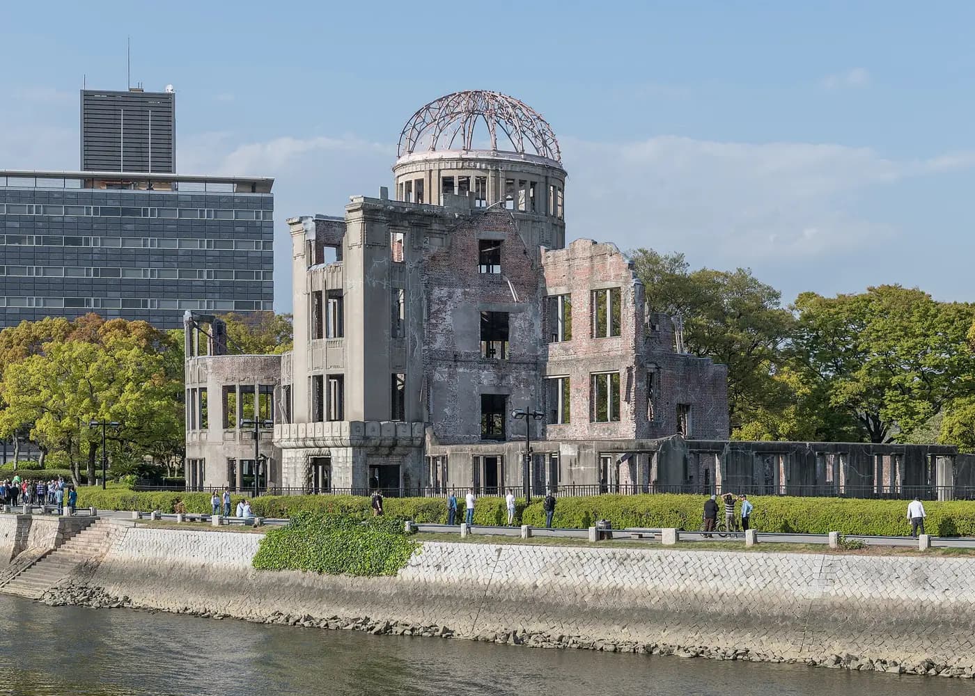 The ruined Atomic Bomb Dome beside the river in Hiroshima Peace Memorial Park