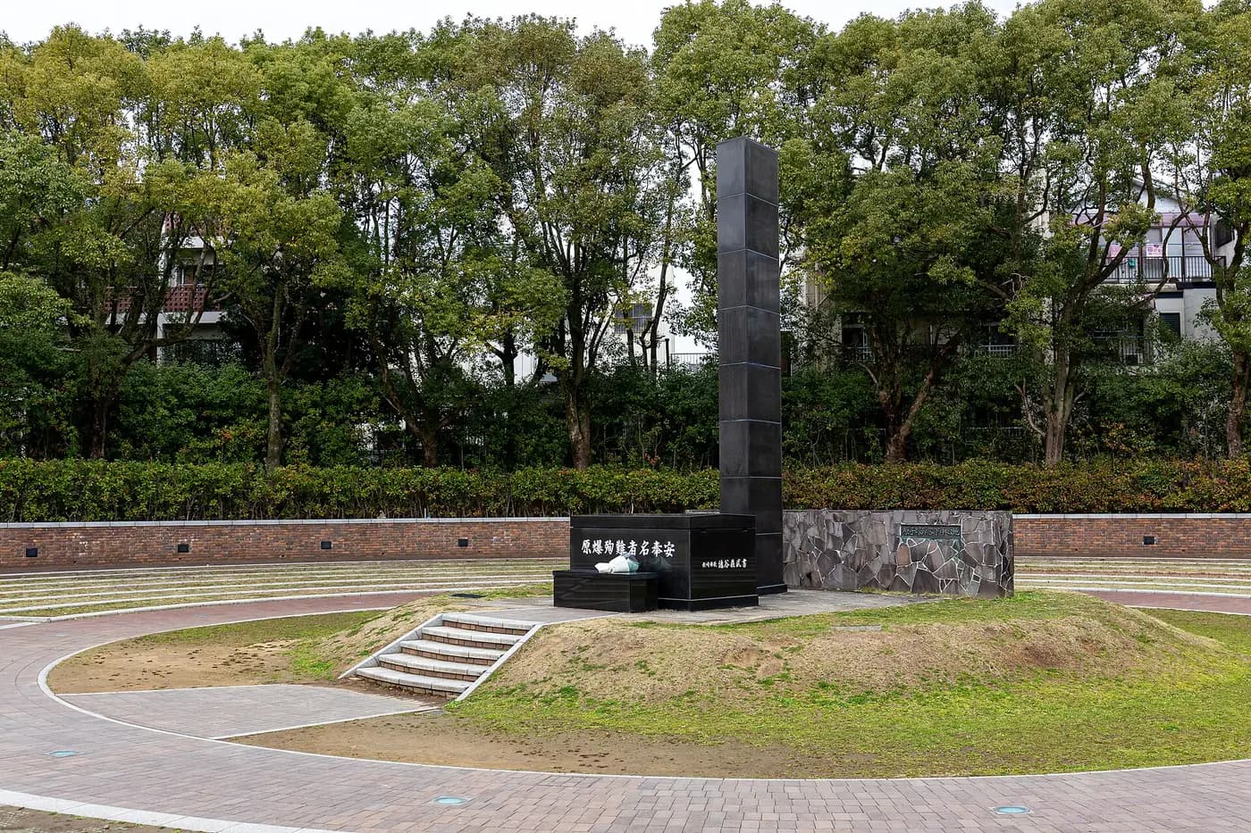 The black monument marking the hypocentre of the atomic bombing in Nagasaki's Peace Park