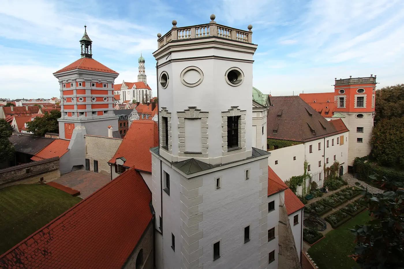 Augsburg's historic water towers at the Red Gate, with the onion dome of St Ulrich beyond