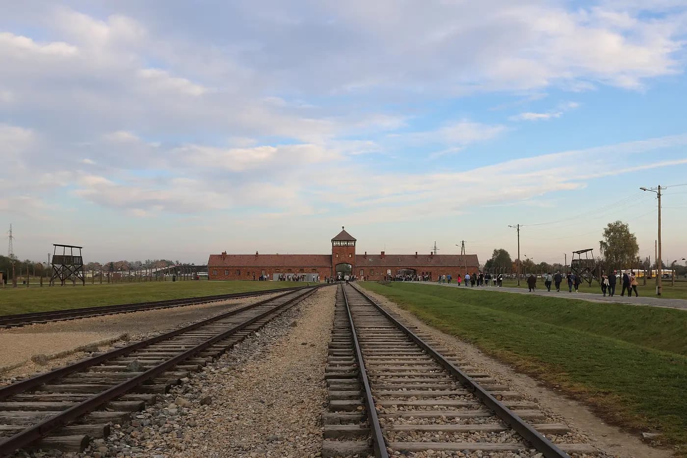The gatehouse and railway tracks entering Auschwitz II-Birkenau
