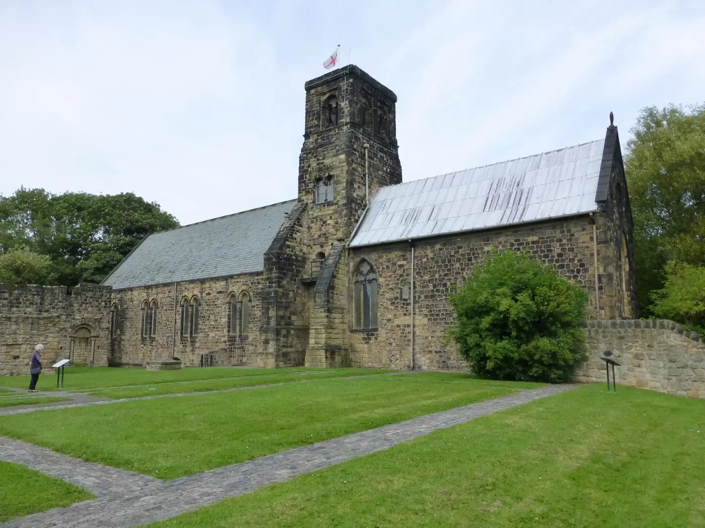 St Paul's Church at Jarrow with its Anglo-Saxon tower, beside the low stone remains of Bede's monastery