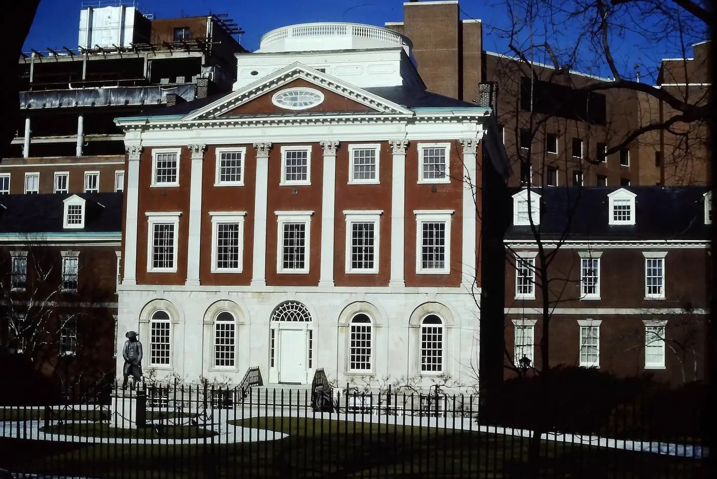 The Pine Building of Pennsylvania Hospital, which Benjamin Franklin helped found, behind iron railings in Philadelphia
