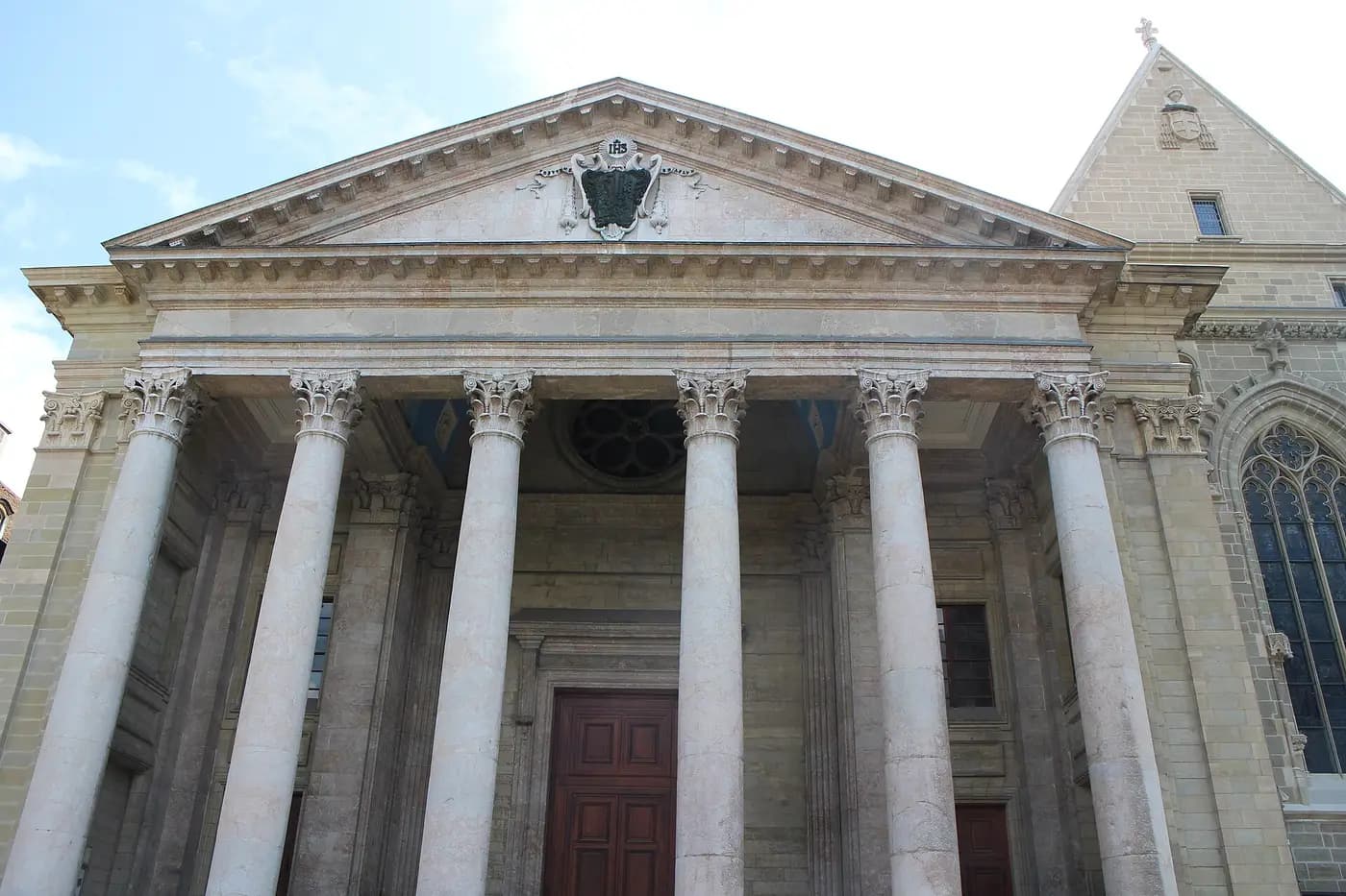 The classical façade and towers of Saint-Pierre Cathedral in Geneva