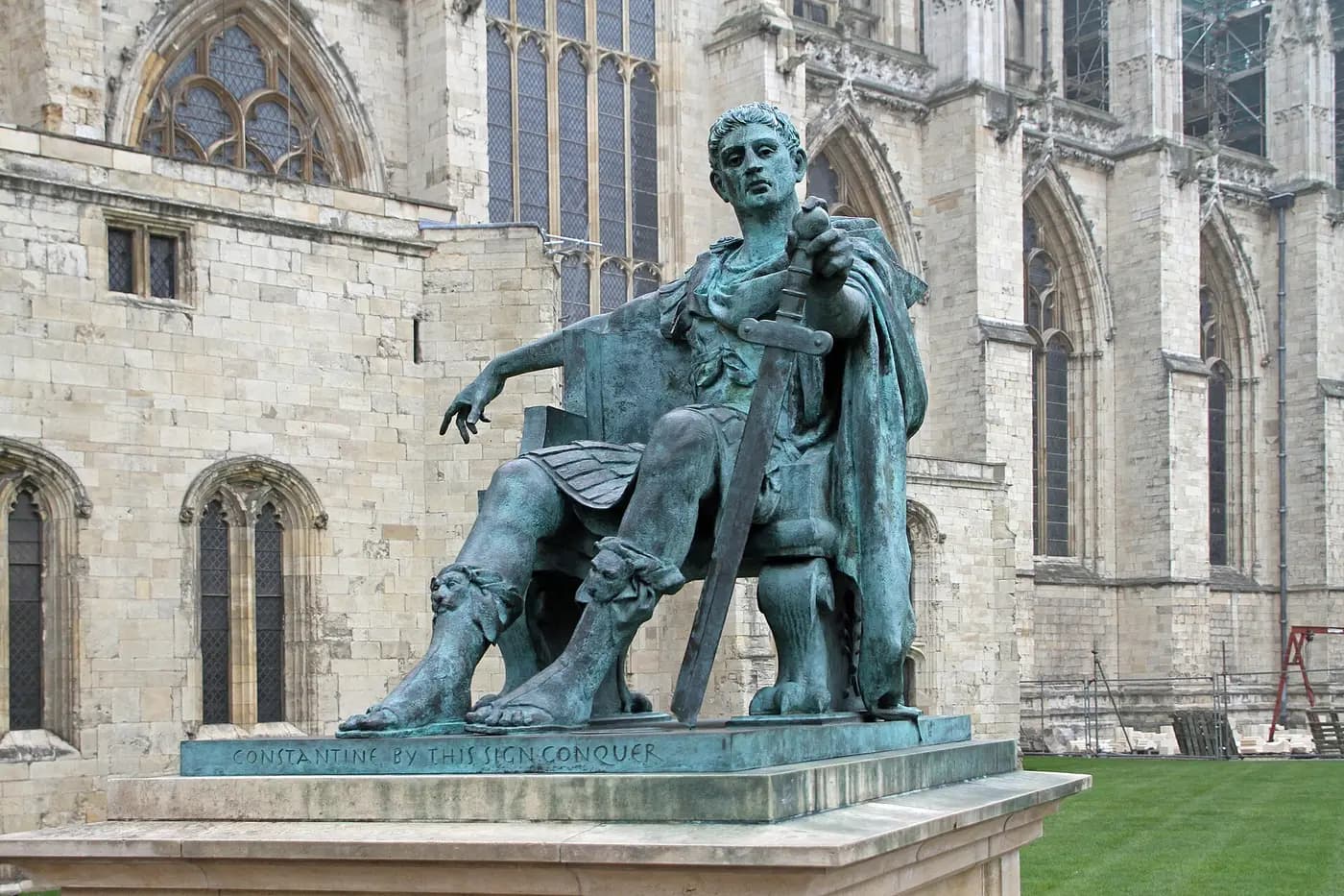 Bronze statue of the emperor Constantine, seated on a throne beside York Minster