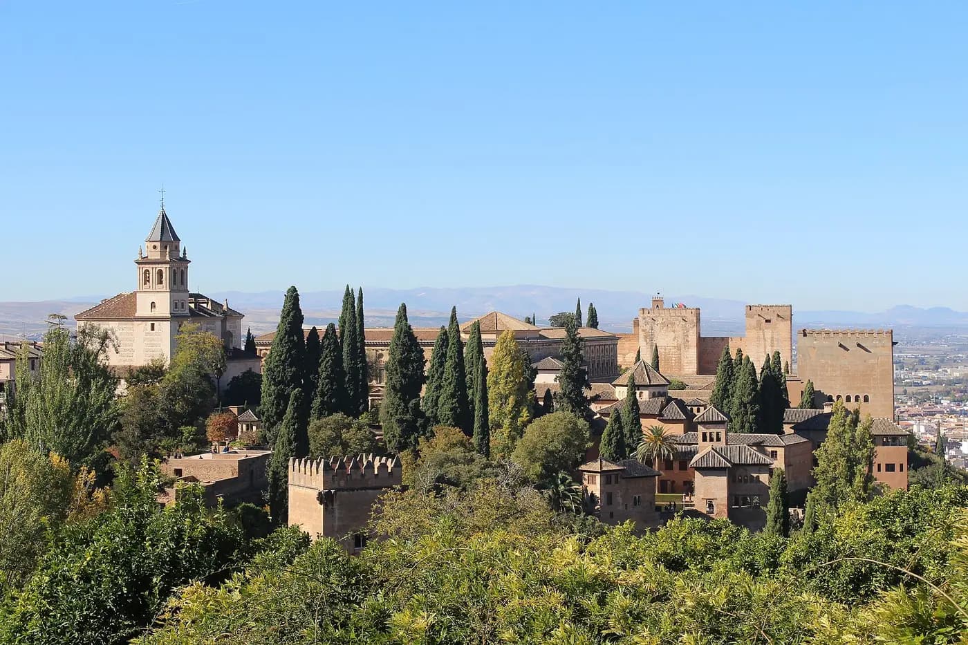 The Alhambra palace-fortress seen across gardens from the Generalife in Granada