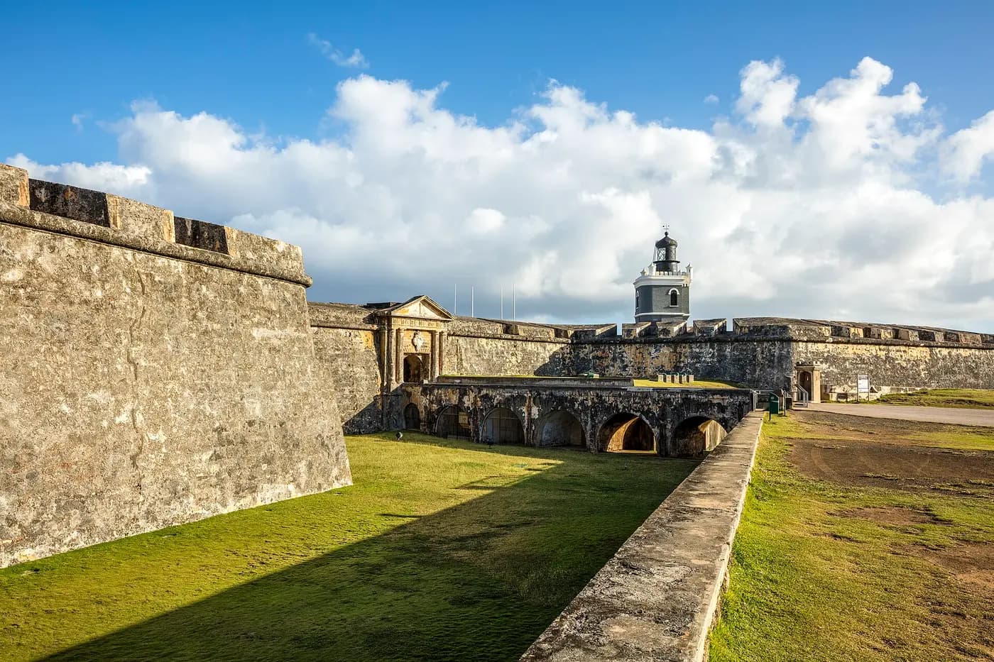 The massive stone walls of Castillo San Felipe del Morro in Old San Juan, with its lighthouse
