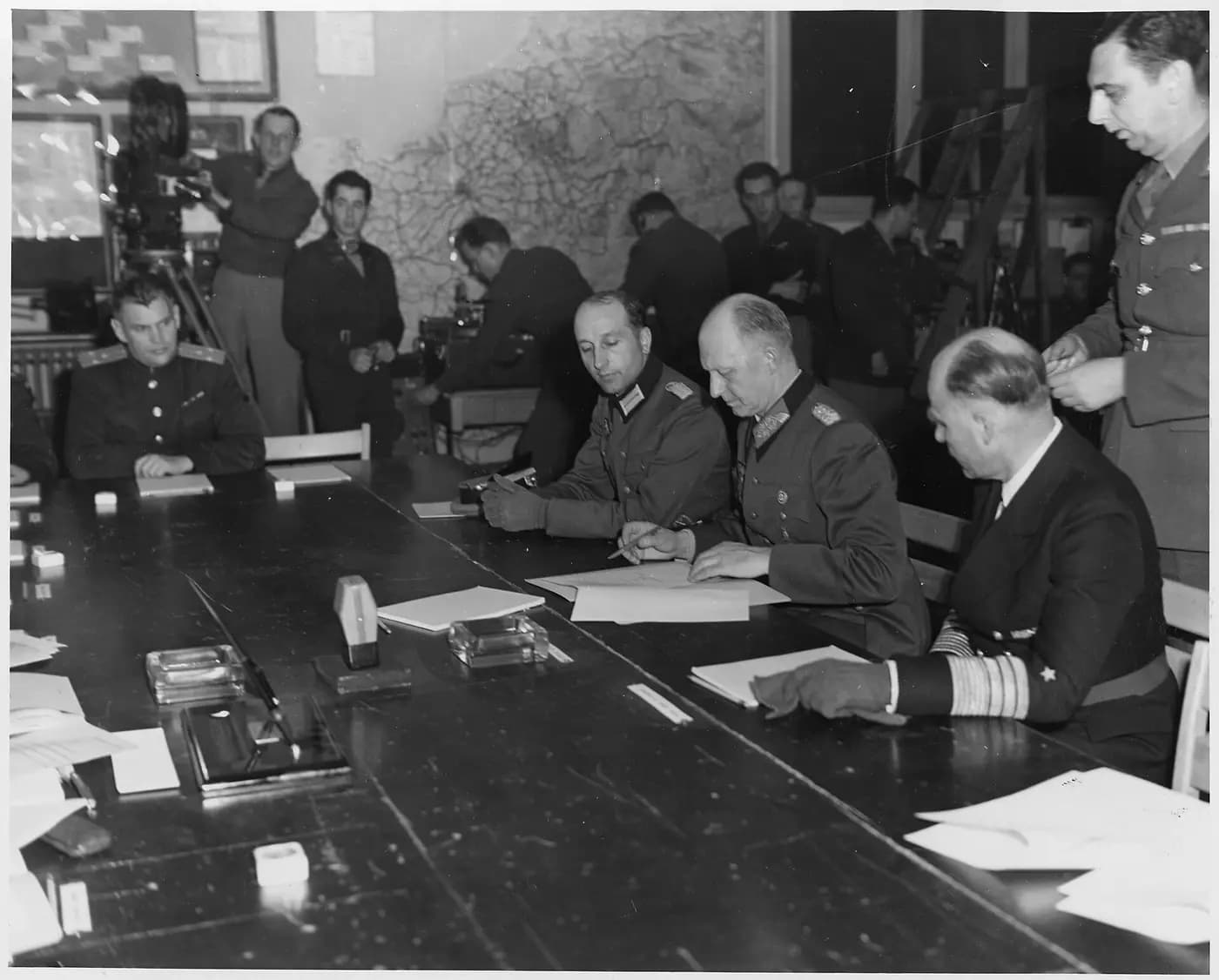 General Alfred Jodl signs Germany's unconditional surrender at Allied headquarters in Reims on 7 May 1945