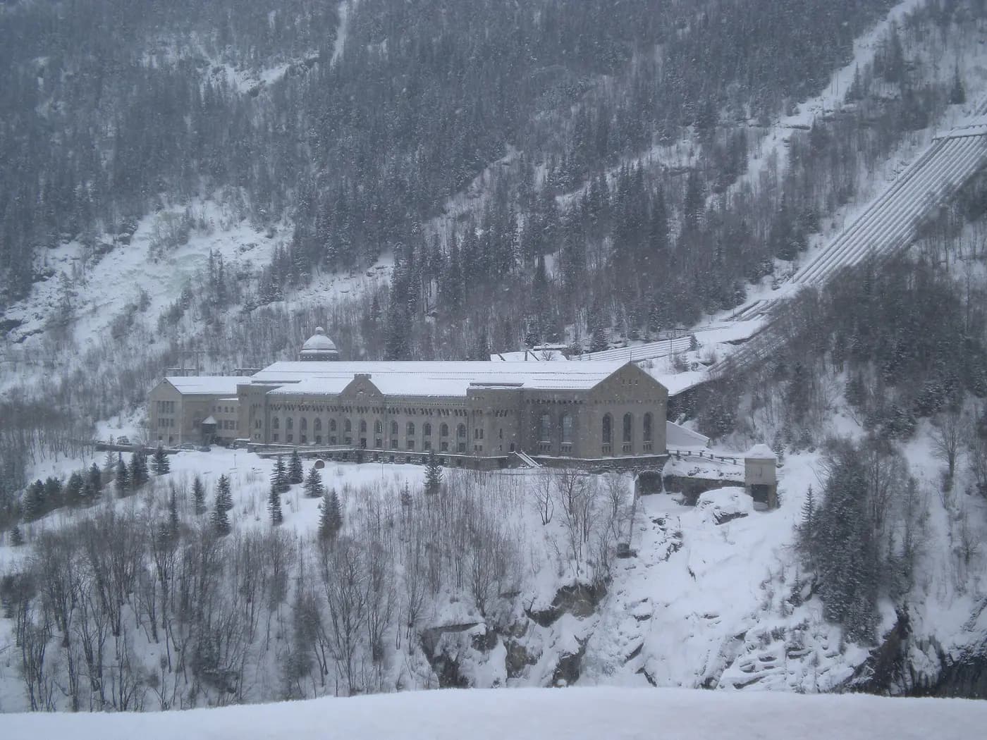 The Vemork power station on its ledge above the snowy Vestfjord gorge near Rjukan