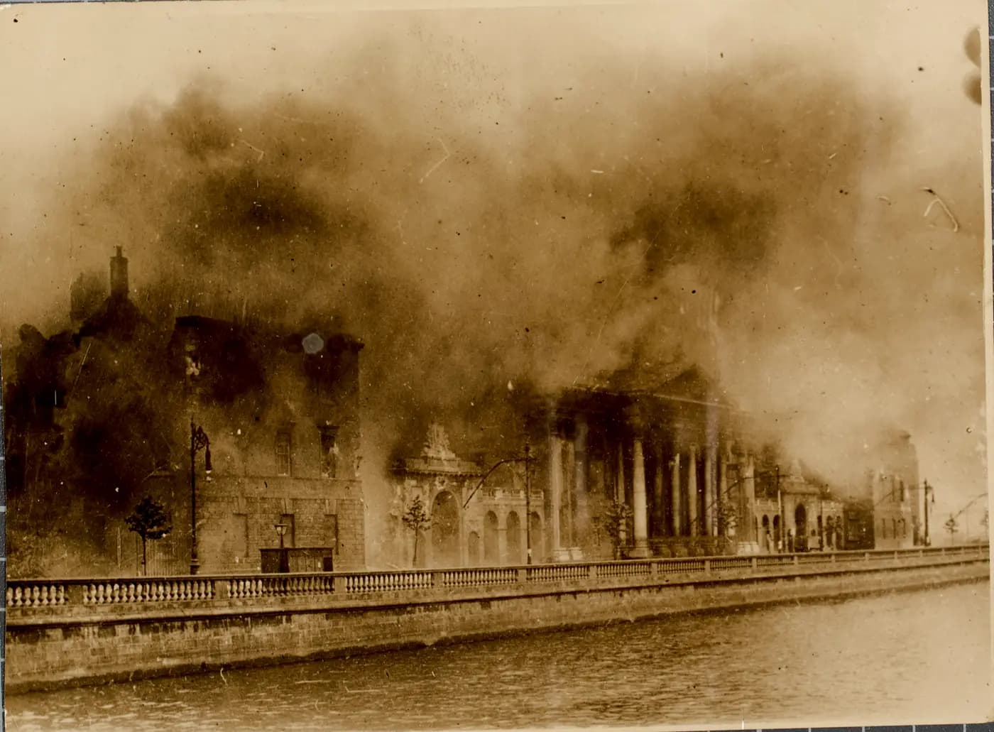 Smoke pours from the Four Courts beside the River Liffey in Dublin on 30 June 1922
