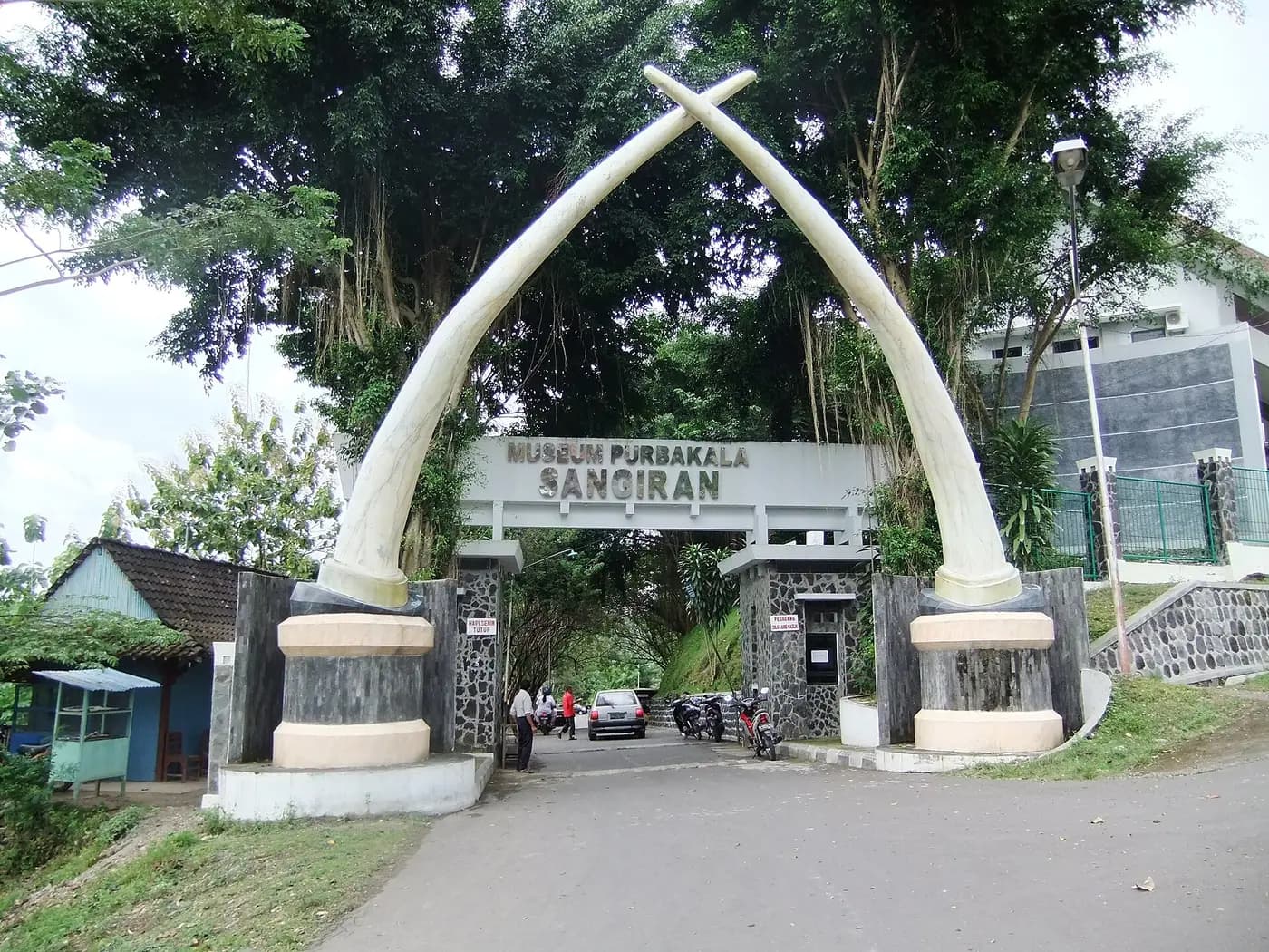 Entrance arch of giant tusks at the Sangiran early-man museum in Central Java