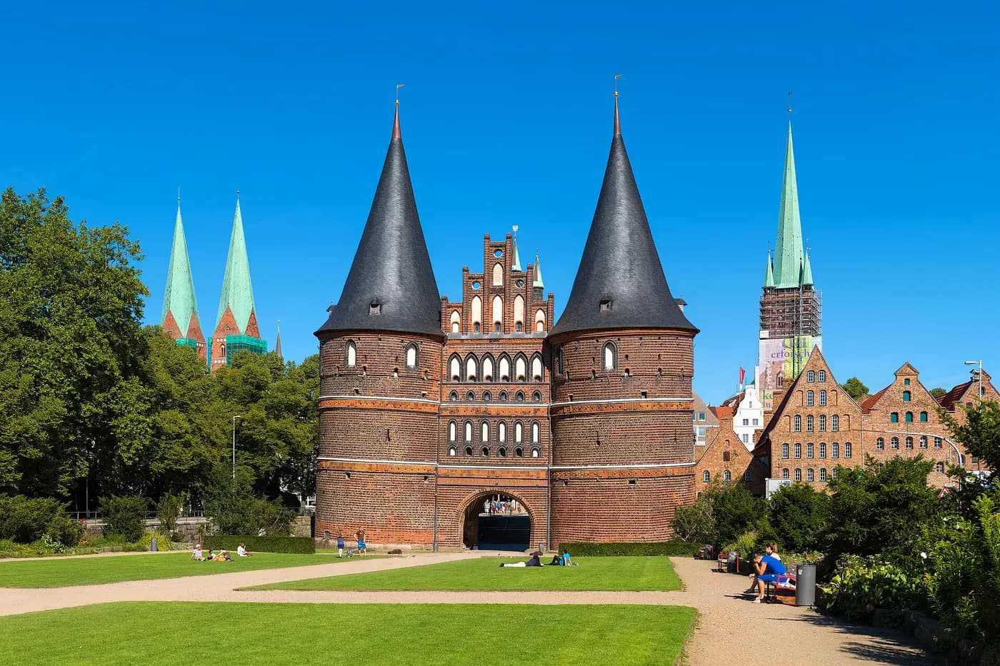 Lübeck's twin-towered Holstentor gate, with the spires of the old town's churches behind