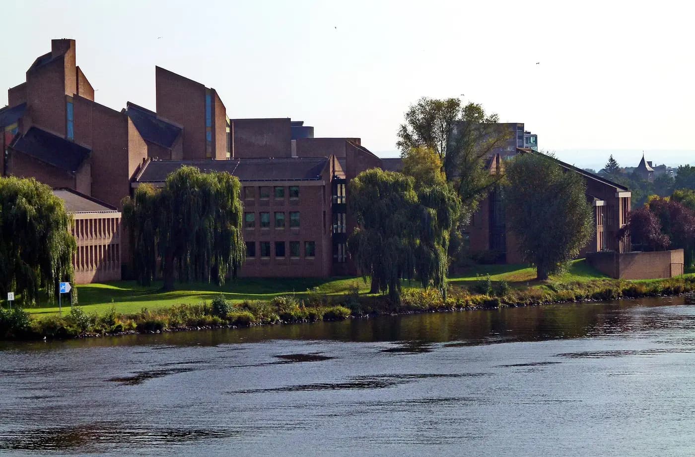 The brick Gouvernement aan de Maas provincial building on its island in the Meuse at Maastricht