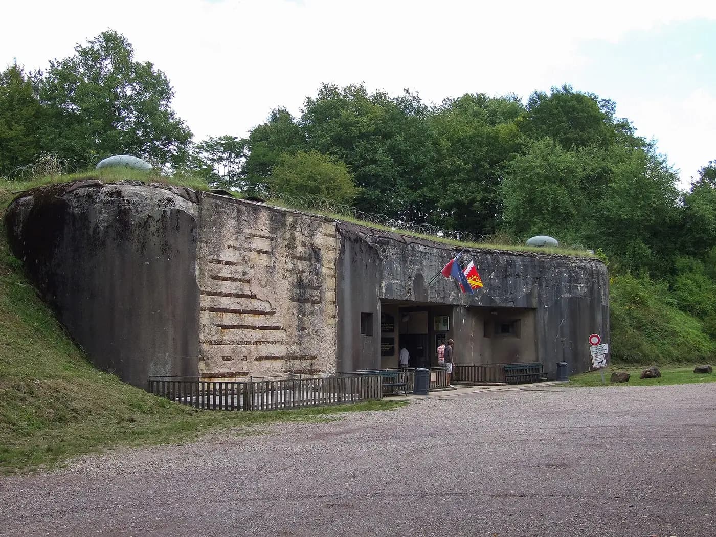 The concrete entrance block of the Four-à-Chaux fort on the Maginot Line near Lembach, set into a wooded hill