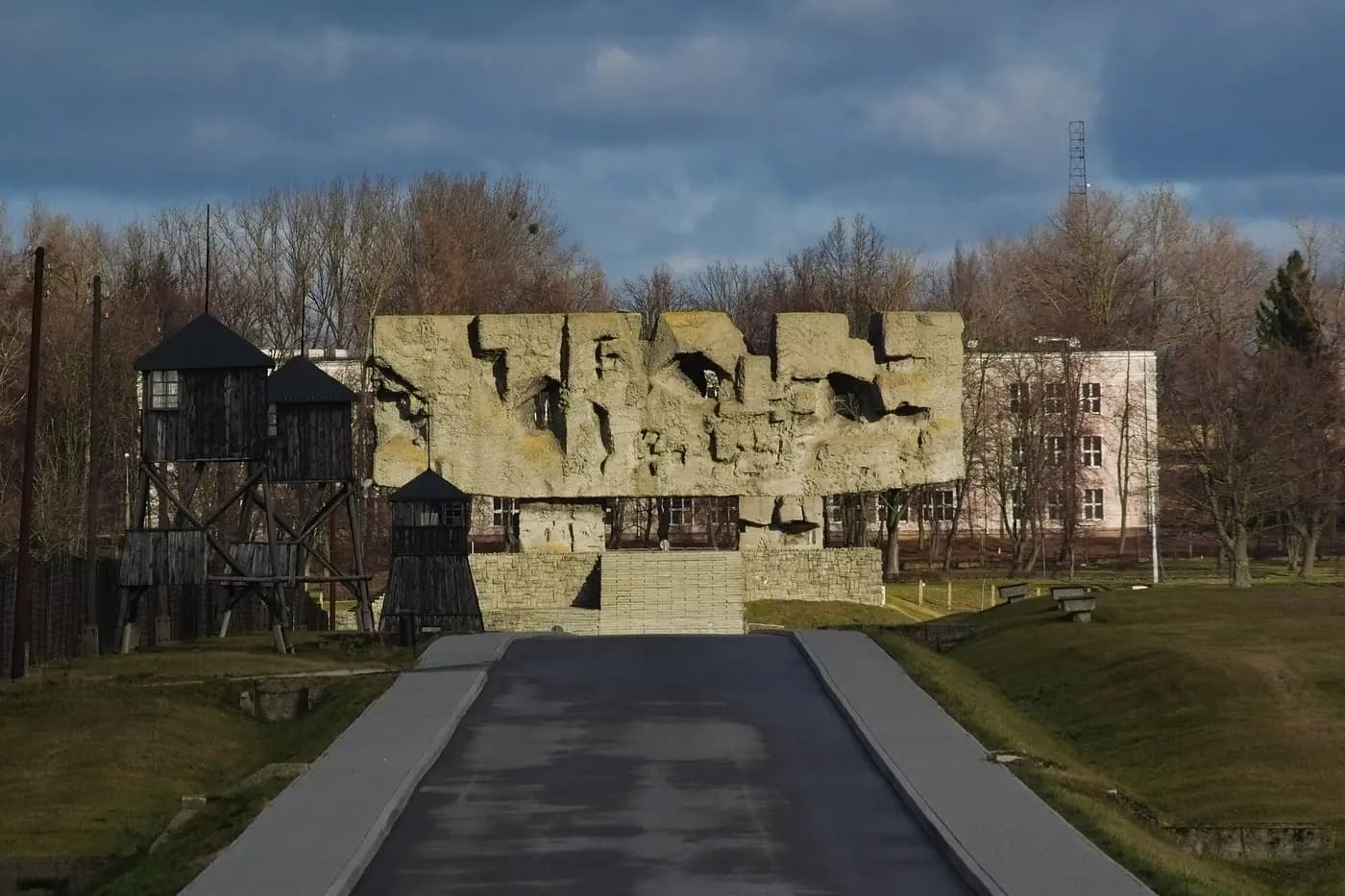 The Monument of Struggle and Martyrdom at the entrance to Majdanek, beside a camp watchtower