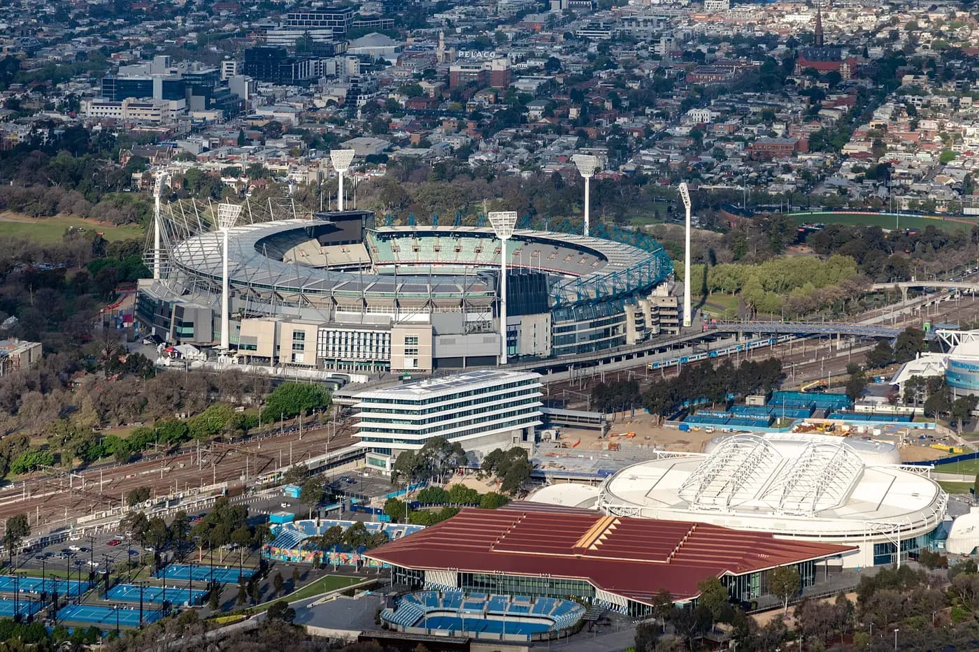 The Melbourne Cricket Ground and the neighbouring sports precinct beside the rail yards, seen from above