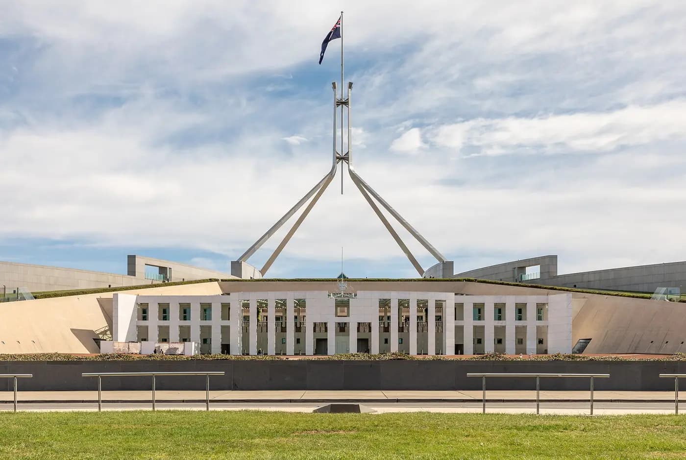 Parliament House in Canberra, with its forecourt and giant flagmast, where the apology was delivered in 2008