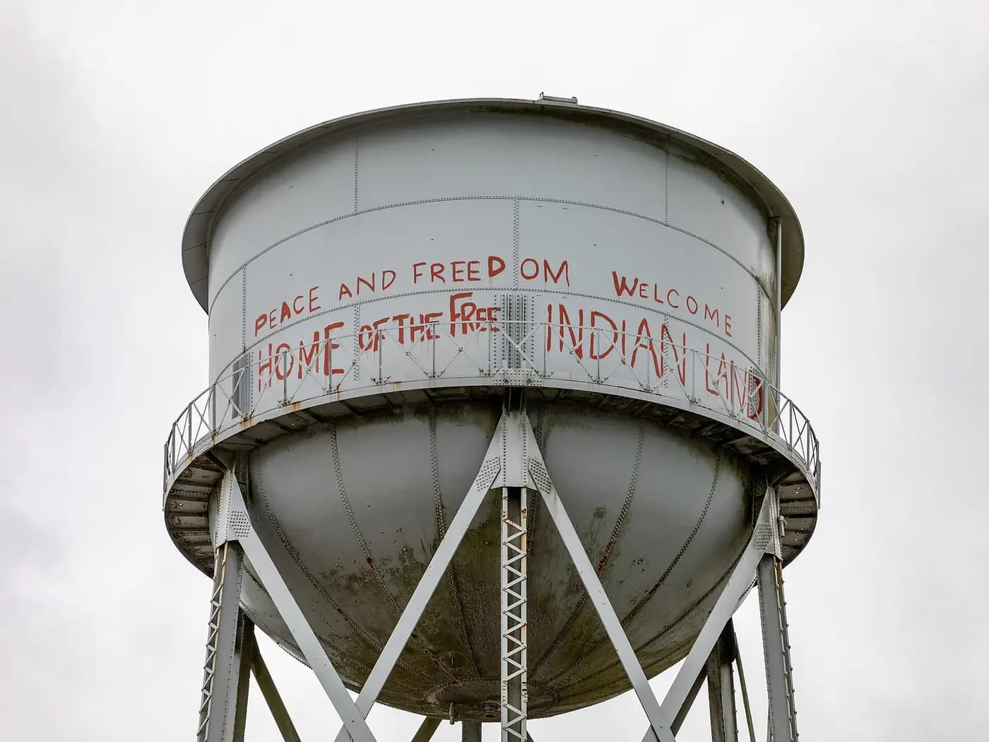 Alcatraz water tower still painted with the occupiers' words: Peace and Freedom, Home of the Free Indian Land