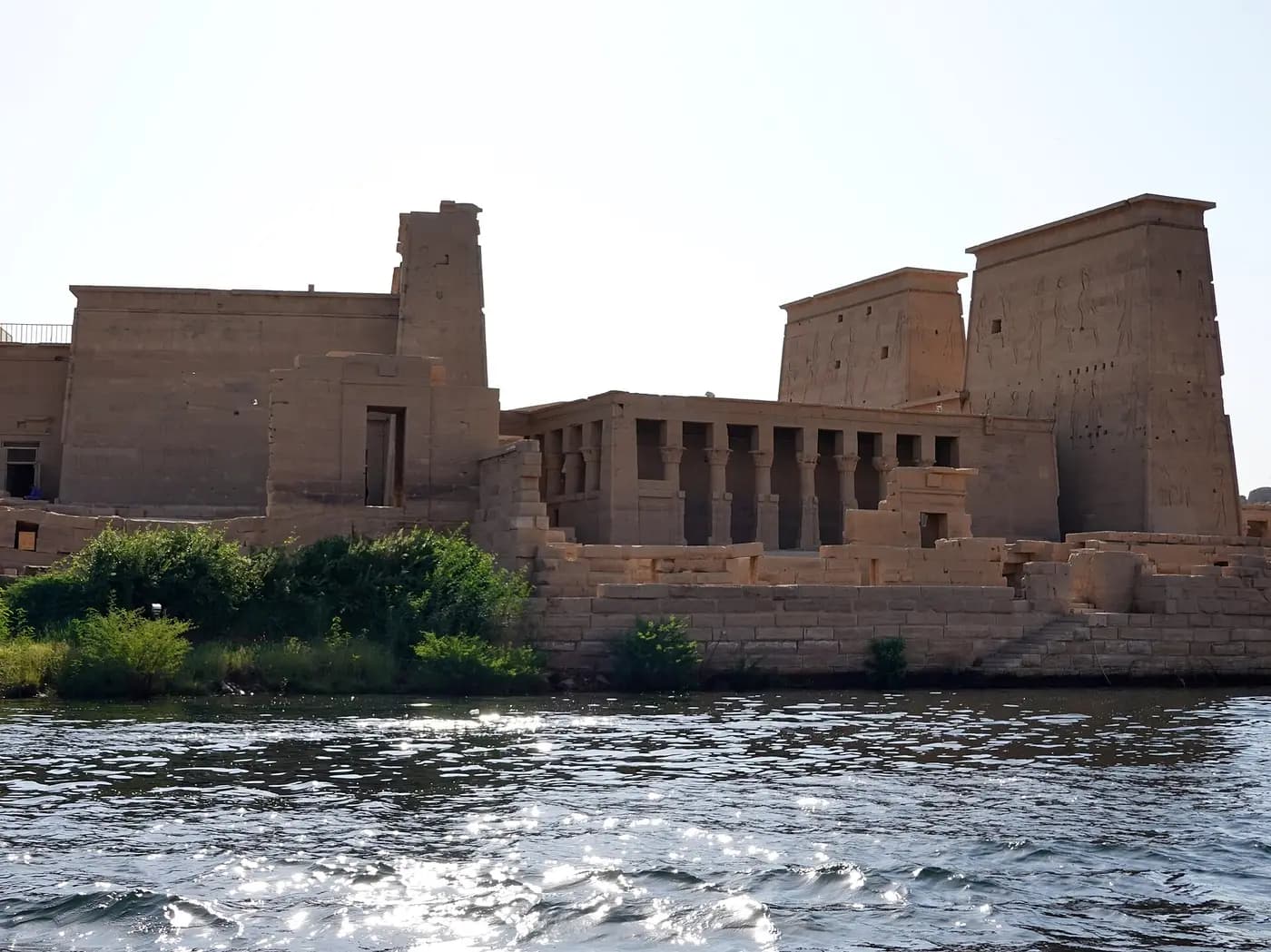 The pylons and colonnades of the Temple of Isis on Agilkia Island, seen from the water