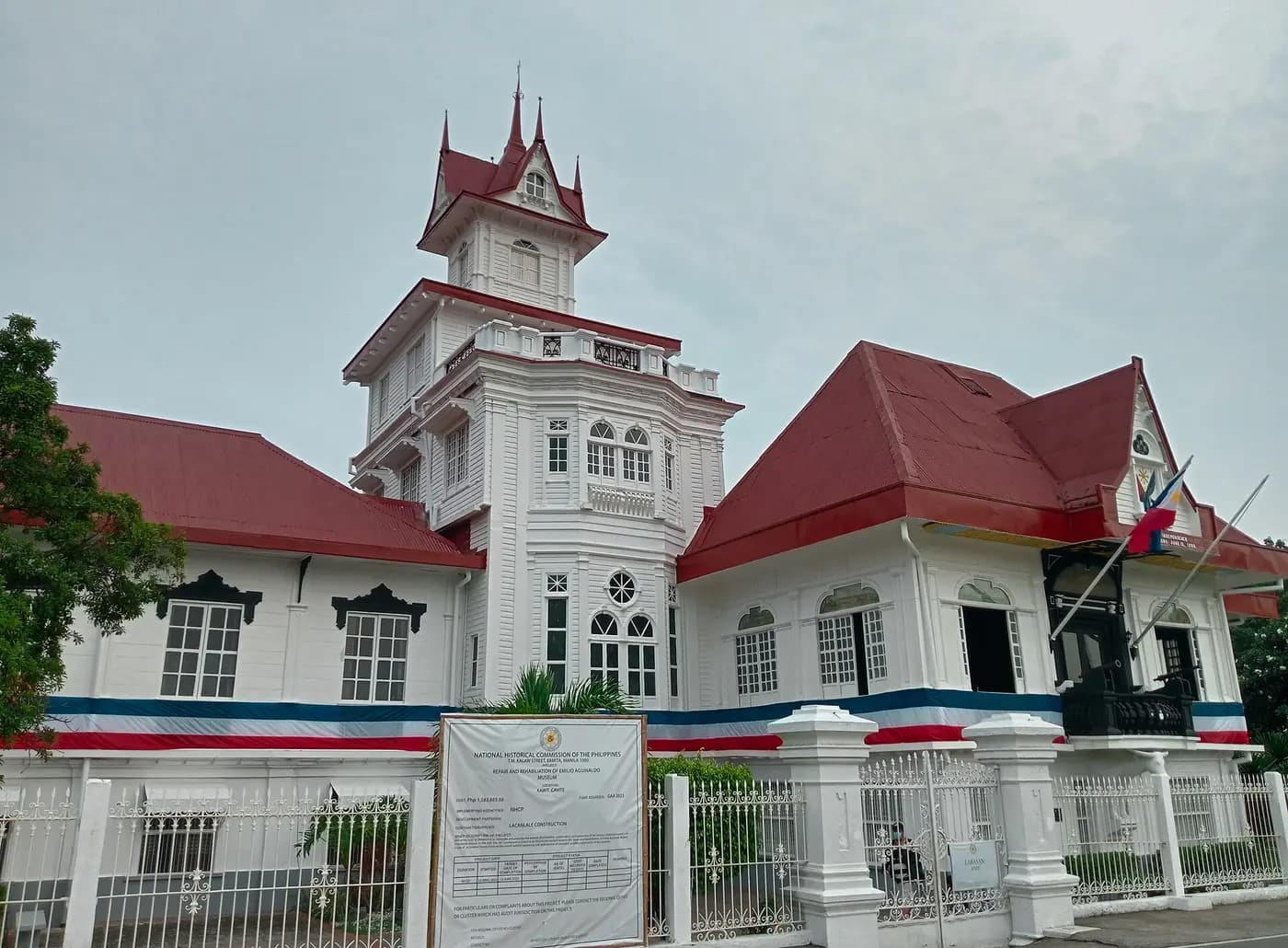 The white and red Aguinaldo house in Kawit, with its tower and balcony
