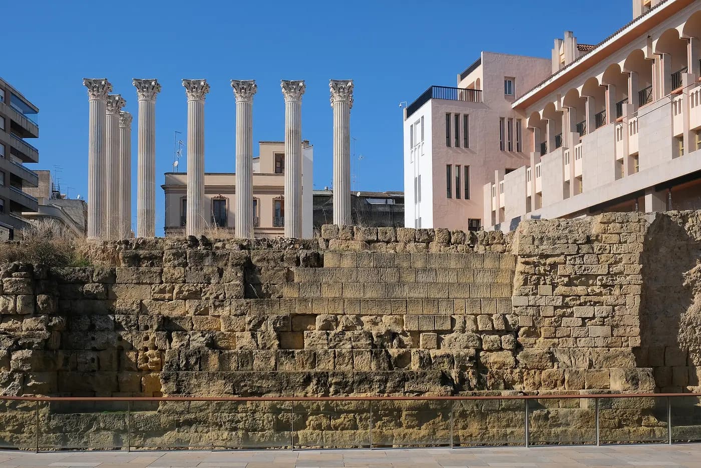 Re-erected Corinthian columns of Córdoba's Roman temple standing above its stone podium