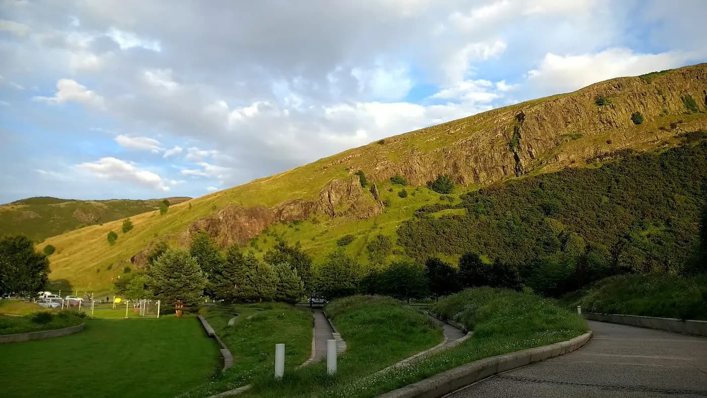 The cliffs of Salisbury Crags and the Radical Road path in Holyrood Park, Edinburgh