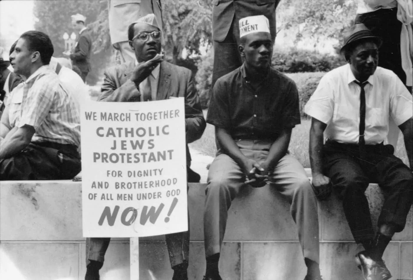 Civil rights marchers resting by the road during the Selma to Montgomery march, Alabama, 1965