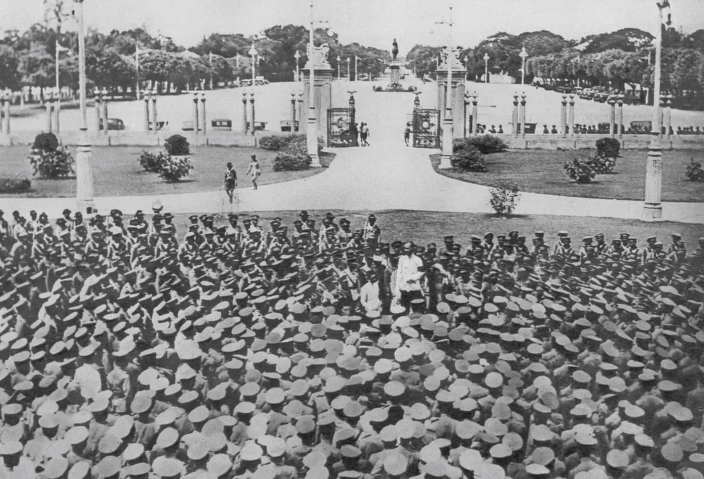 Soldiers and cadets crowd the Royal Plaza in Bangkok on 24 June 1932