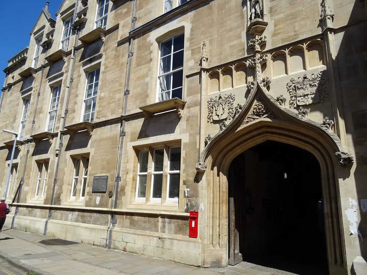 The stone Gothic gateway of the old Cavendish Laboratory on Free School Lane, Cambridge