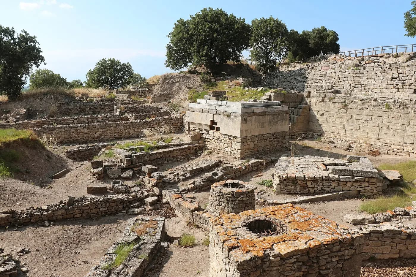 Excavated stone walls and ruins at the archaeological site of Troy