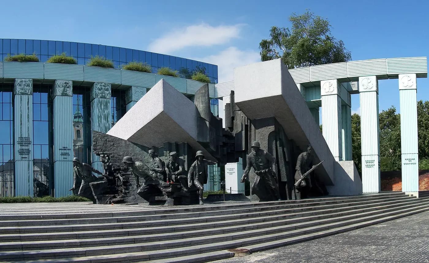 The Warsaw Uprising Monument on Krasiński Square, with bronze insurgents emerging from collapsing walls