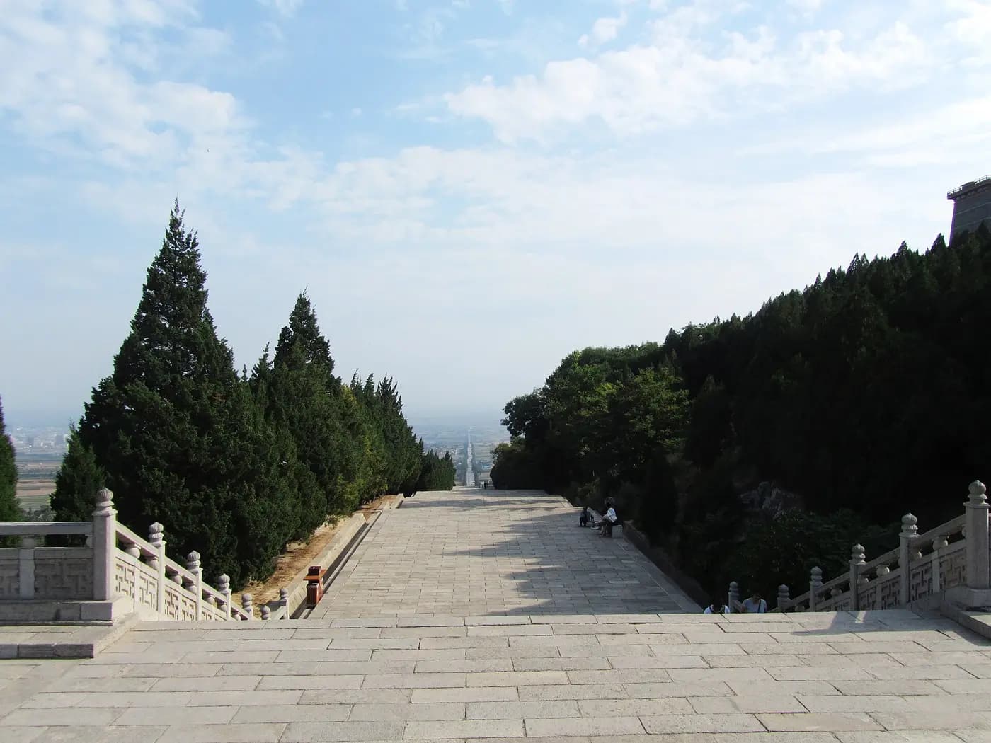 The long stone spirit way of the Qianling Mausoleum, tomb of Wu Zetian, flanked by cypress trees