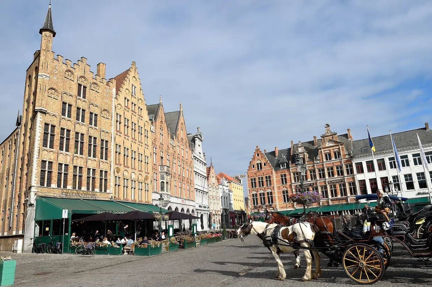 Gabled guild houses and the belfry on Bruges' Market Square