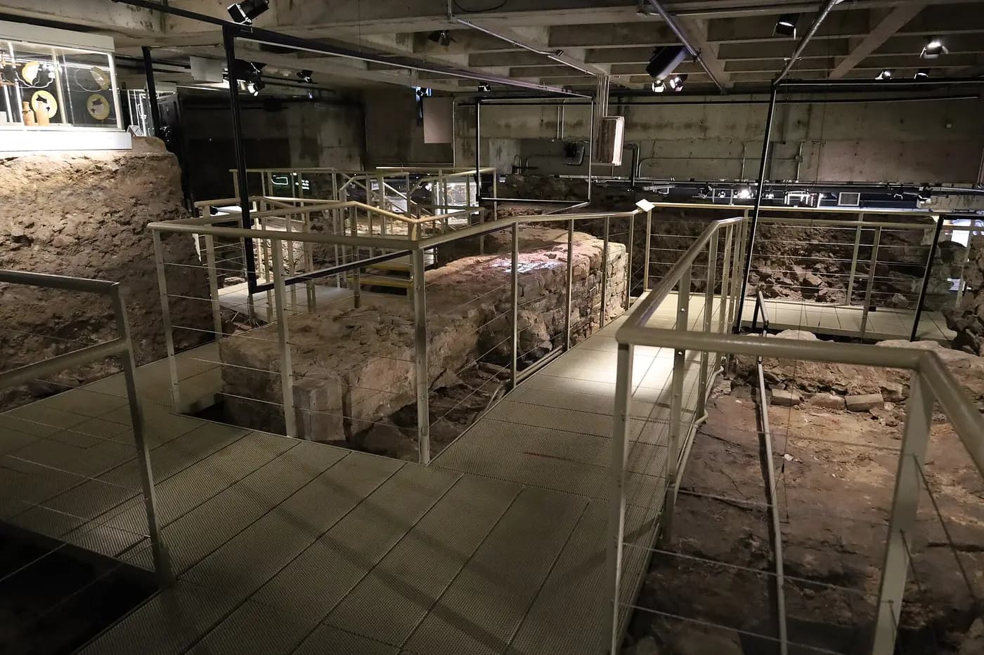 Walkways over excavated stone foundations in the basement of the Pointe-à-Callière museum, Old Montreal