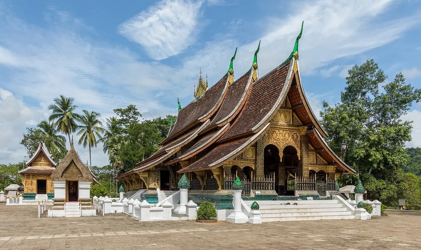The sweeping tiered roofs of Wat Xieng Thong, the royal temple of Luang Prabang